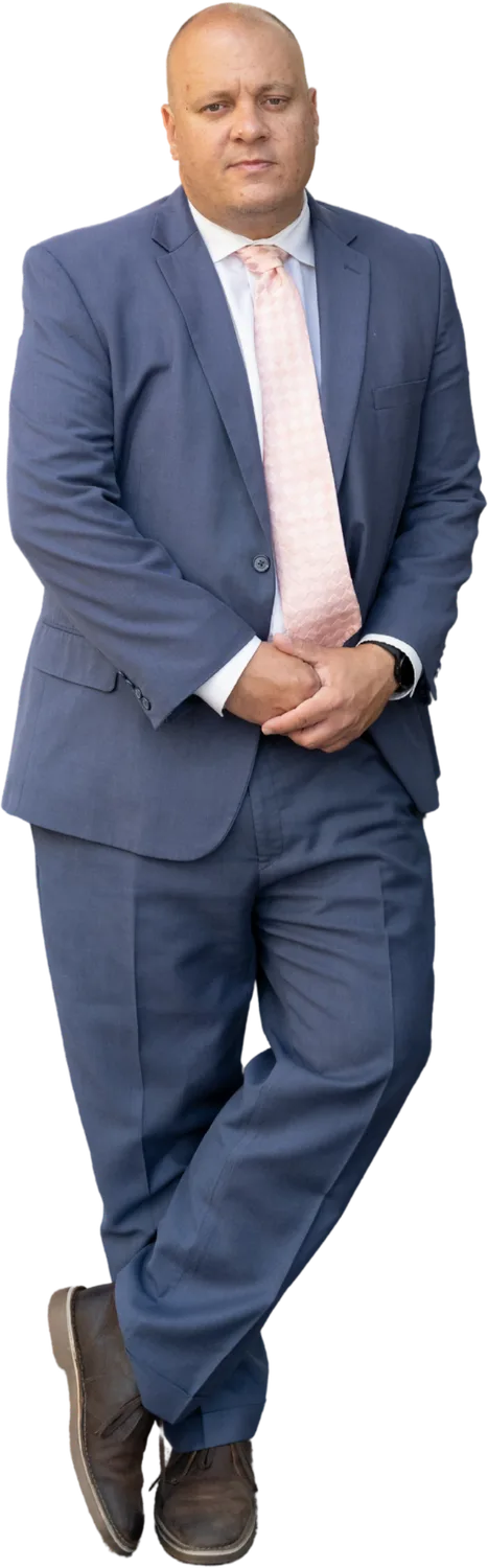 San Diego criminal defense attorney Marc S. Kohnen standing against the San Diego skyline