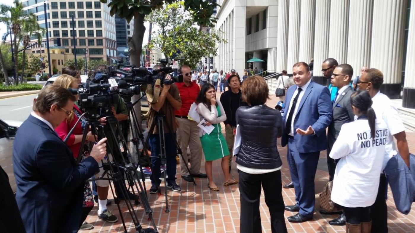 San Diego criminal defense attorney Marc Kohnen speaking at a press conference on a high-profile case